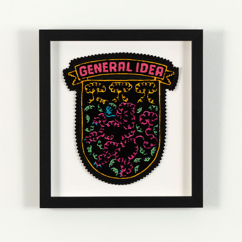 General Idea "When Fur Flies" Chenille crest, 1988. Embroidered crest featuring a whimsical poodle silhouette in neon shades of orange, pink, and blue.