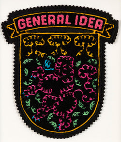 General Idea "When Fur Flies" Chenille crest, 1988. Embroidered crest featuring a whimsical poodle silhouette in neon shades of orange, pink, and blue.