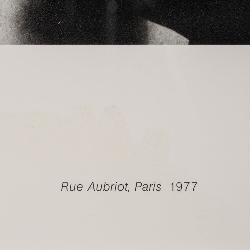 Text 'Rue Aubriot, Paris 1977' on a gray background