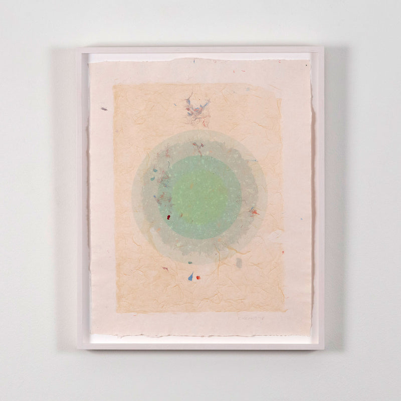Kenneth Noland. "Circle Series I-35"  USA, 1978  Signed and dated 78 by the artist. The work is composed of five layers of colored pulp with elements of lithography printing. The vibrant celadon green in the center creates a glowing orb against the vanila background. The result is both alluring and hypnotic.