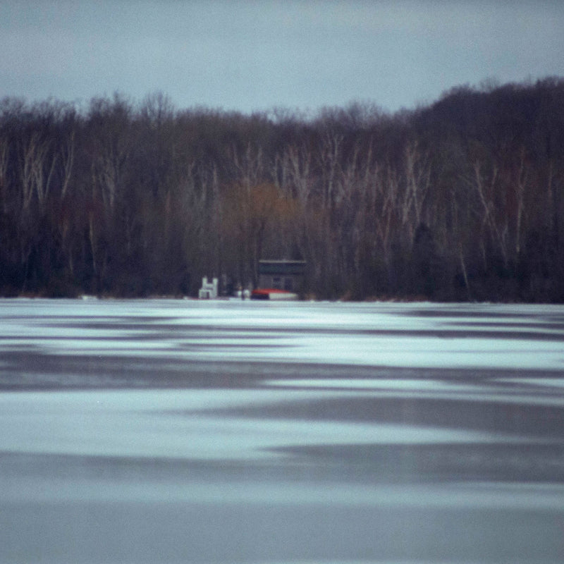 Dreamlike winter nature photography by contemporary artist Peter Doig. Framed landscape photography by famous contemporary artist Peter Doig. "Across the Lake" C-print, 2000.  