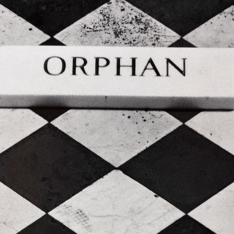 Sophie Callie "Orphan" Gelatin silver print, 1994. "Orphan" is a poignant example of the artist's inquiry into death, loss, and departure. The photograph features a close crop of a black and white checkered tombstone with an inscription plaque that reads, 'Orphan.'     
