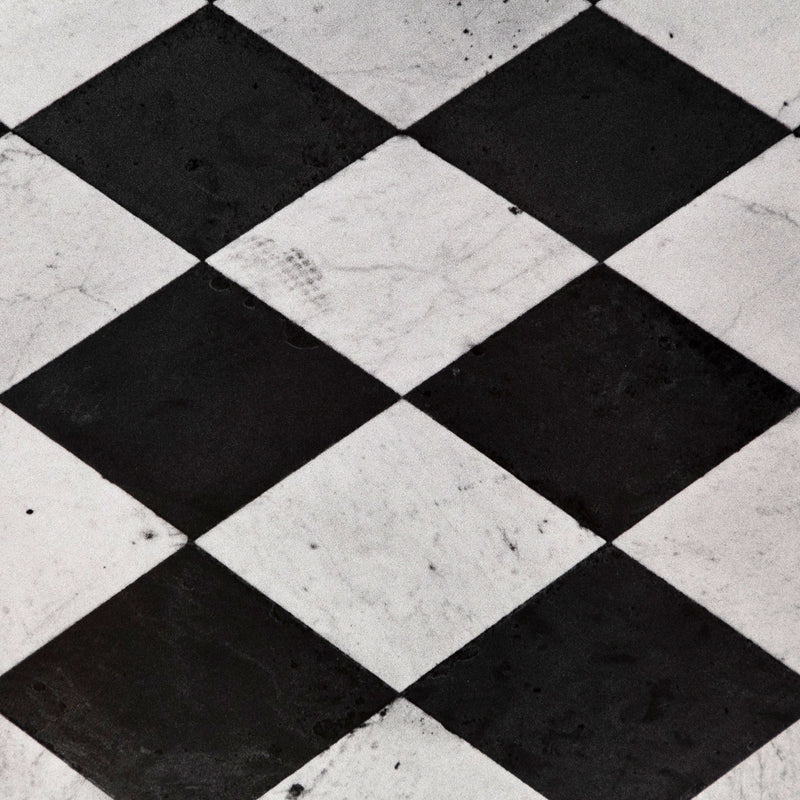 Sophie Callie "Orphan" Gelatin silver print, 1994. "Orphan" is a poignant example of the artist's inquiry into death, loss, and departure. The photograph features a close crop of a black and white checkered tombstone with an inscription plaque that reads, 'Orphan.'     
