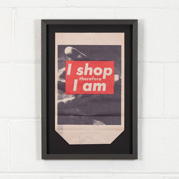 Barbara Kruger multiples I shop therefore I am bag Caviar20, shown framed and installed on white brick wall