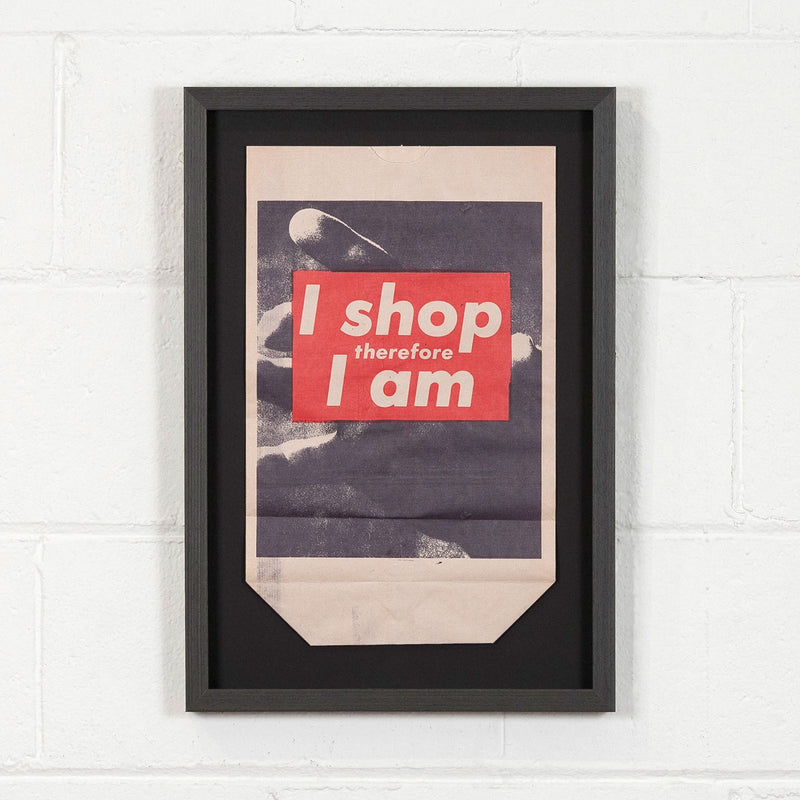 Barbara Kruger multiples I shop therefore I am bag Caviar20, shown framed and installed on white brick wall