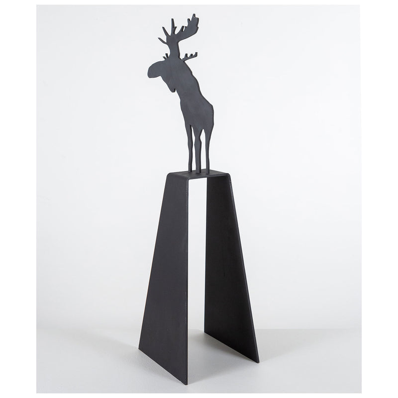 Charles Pachter "Mooseamour 26" Sculpture, 1999. Pachter's Mooseamour is an iconic piece from his oeuvre. This monochromatic piece features a crisp silhouette of a moose which stands on top of a heightened mount. The moose is a recurring motif for Pachter and a key identifier of his "Canadiana" aesthetic.