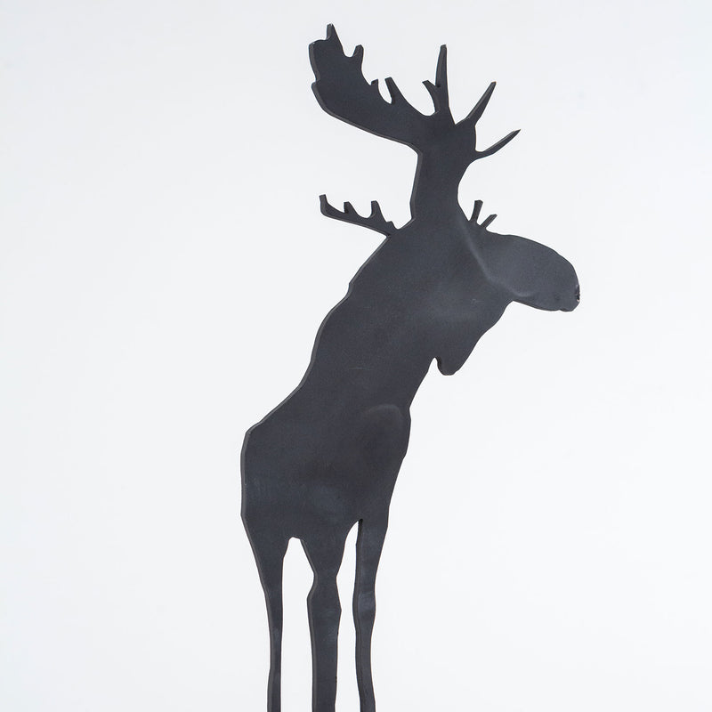 Charles Pachter "Mooseamour 26" Sculpture, 1999. Pachter's Mooseamour is an iconic piece from his oeuvre. This monochromatic piece features a crisp silhouette of a moose which stands on top of a heightened mount. The moose is a recurring motif for Pachter and a key identifier of his "Canadiana" aesthetic.