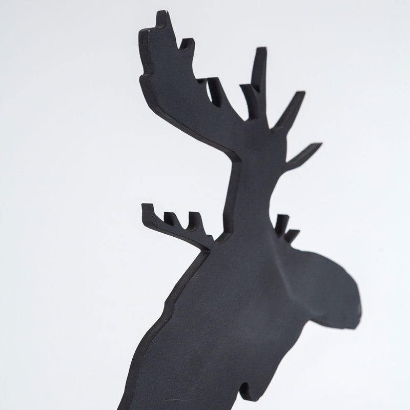 Charles Pachter "Mooseamour 26" Sculpture, 1999. Pachter's Mooseamour is an iconic piece from his oeuvre. This monochromatic piece features a crisp silhouette of a moose which stands on top of a heightened mount. The moose is a recurring motif for Pachter and a key identifier of his "Canadiana" aesthetic.