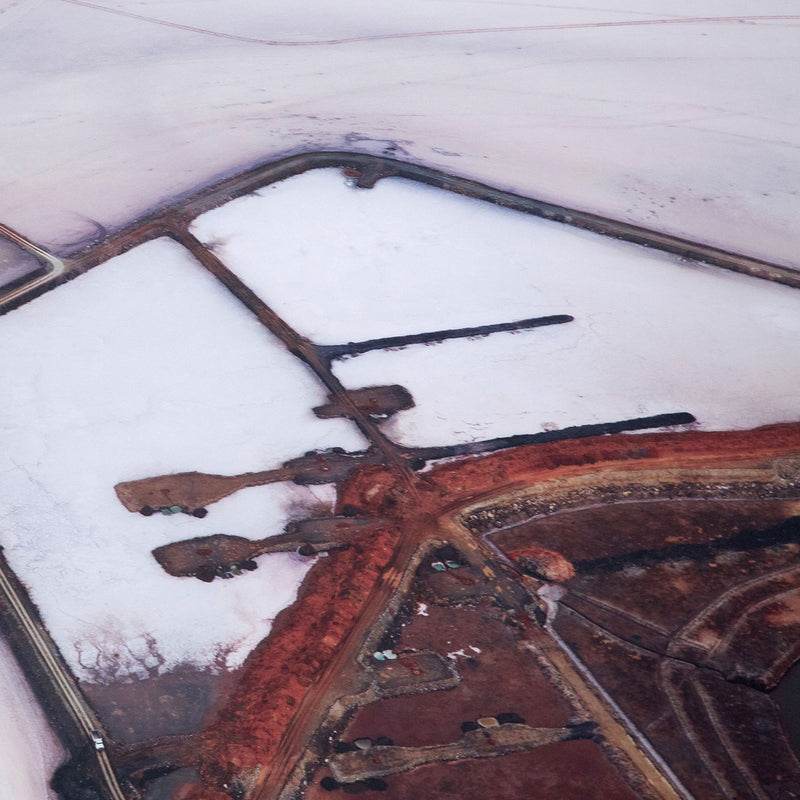 Edward Burtynsky is one of Canada’s most internationally acclaimed photographers.  He is well-known for his captivating, and curiously beautiful, large-scale photographs documenting the ramifications of industrial production on nature.  The recipient of many prestigious international awards, Burtynsky creates photographs of human-inflicted environmental catastrophes that are hauntingly beautiful. As such, he often sets up a strange dichotomy of attraction and repulsion in his photographs.