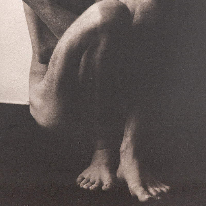 Herb Ritts "Stefano Seated" Platinum print photograph, 1985. “Stefano Seated” is a wonderful example of Ritts’ ability to capture polished intimacy. The subject appears relaxed in the nude yet holds a modelesque grace posing with awareness of the camera. Like many Ritts photographs, this print is expertly rendered in contrasting tones of black and white.