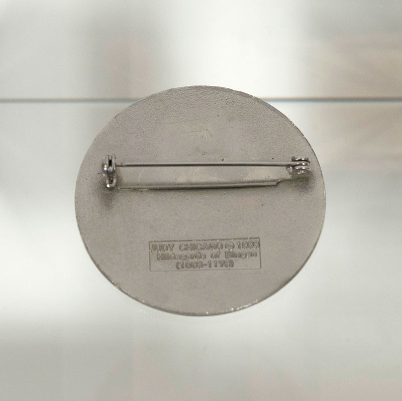 JUDY CHICAGO "HILDEGARD" CLOISONNÉ PIN, 1988