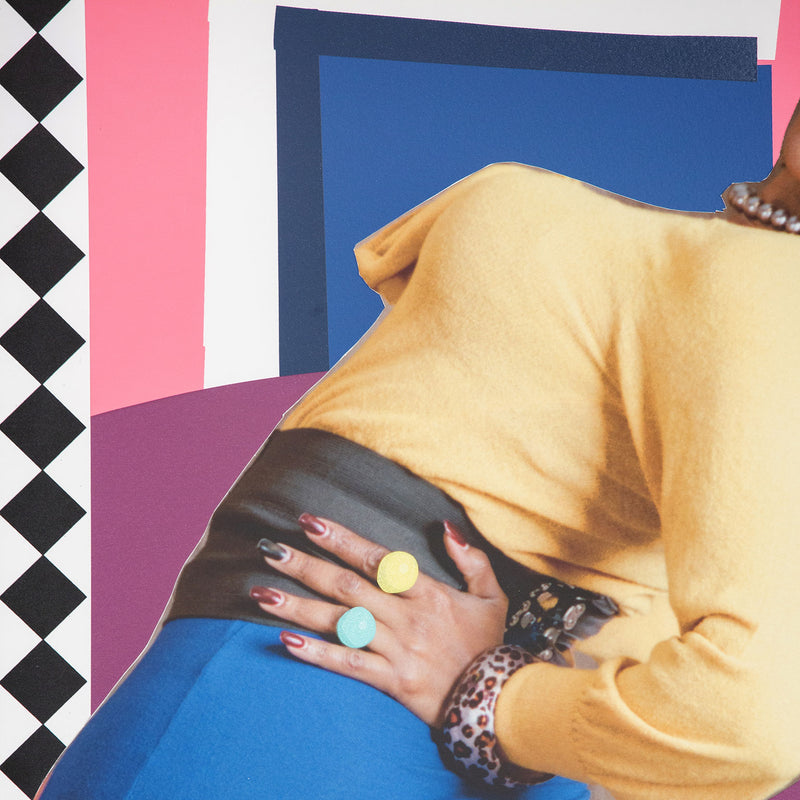 Mickalene Thomas "Keri On" 2019. In this work, Keri's peers over her shoulder at an exaggerated angle, her hand placed firmly on her hip, strengthening her stance as she looks back at the viewer. Typical of Thomas' muses she is both playful and assertive.