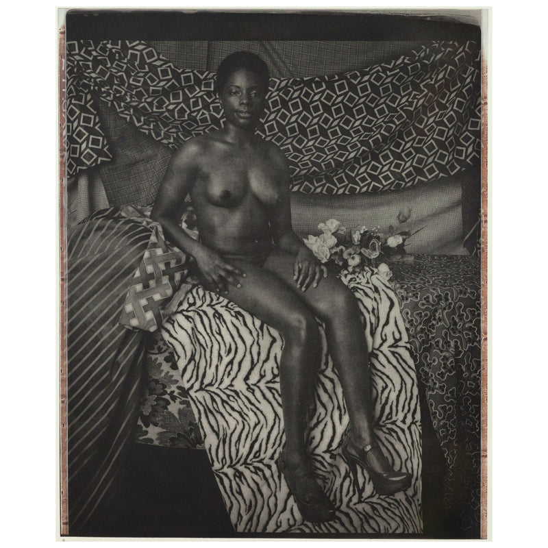 Mickalene Thomas portrait of marie sitting in black and white