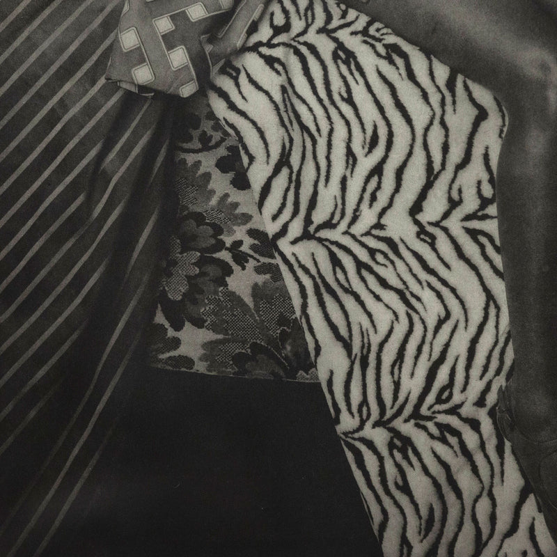 Mickalene Thomas portrait of marie sitting in black and white