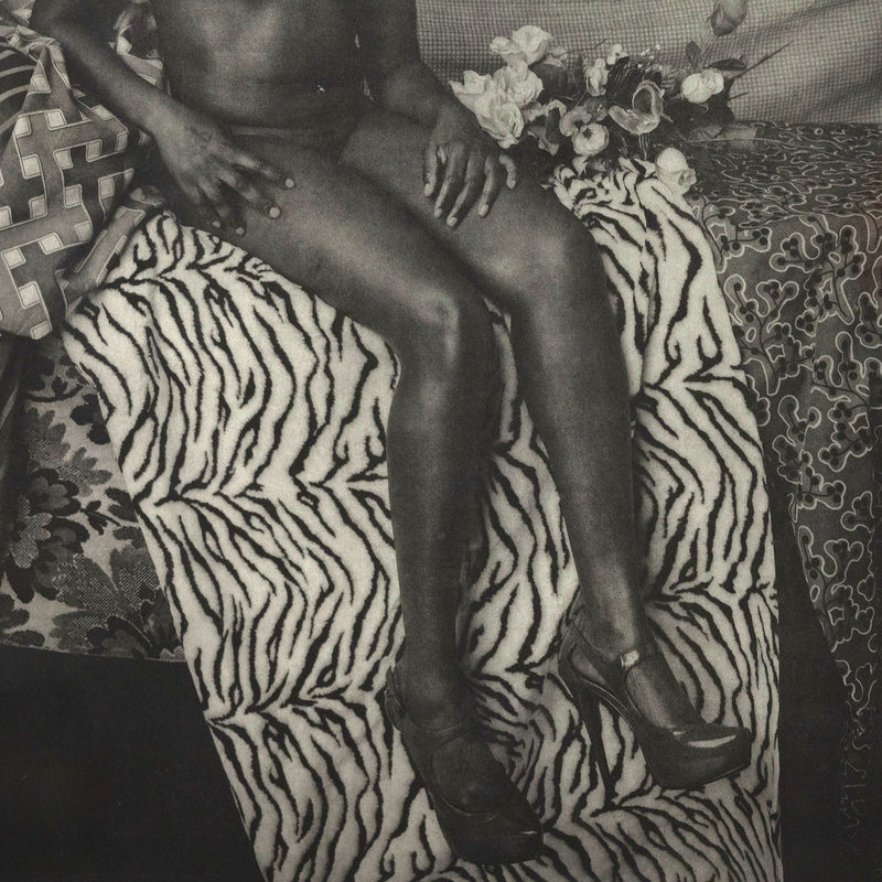 Mickalene Thomas portrait of marie sitting in black and white