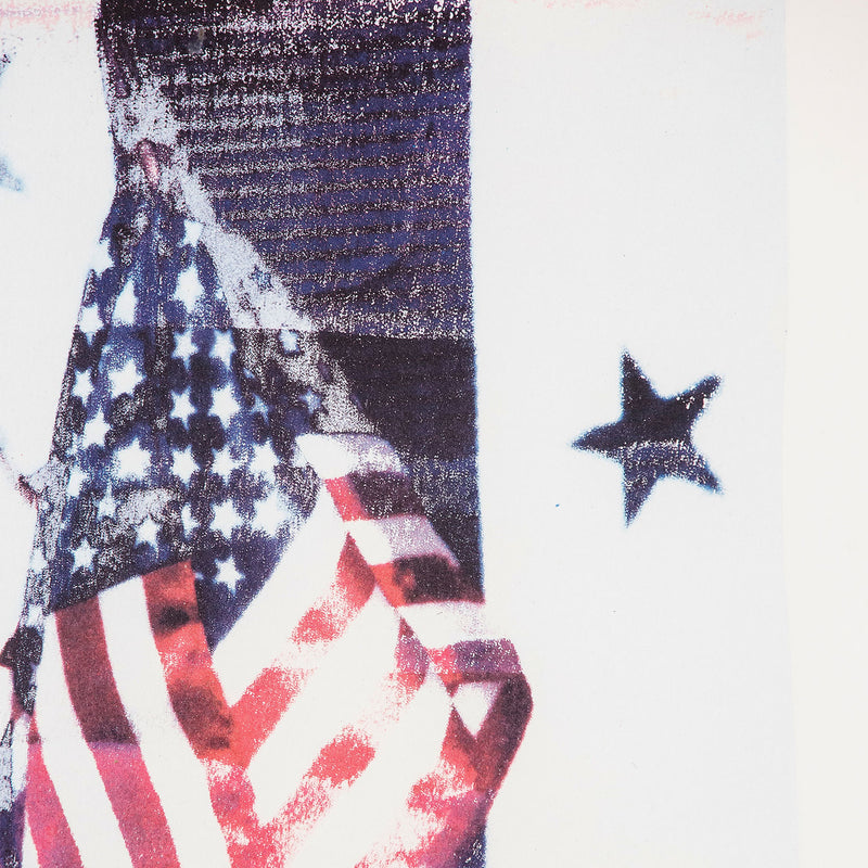 Robert Rauschenberg "For Kennedy" 1994. This complex and patriotic image is a testament to Rauschenberg's unwavering socio-political engagement. Rich, layered images of the American Flag fill the sheet, demonstrating Rauschenberg's iconic collage work and signature aesthetic.