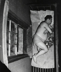 Weegee photography Caviar20 tenement sleeping 1950